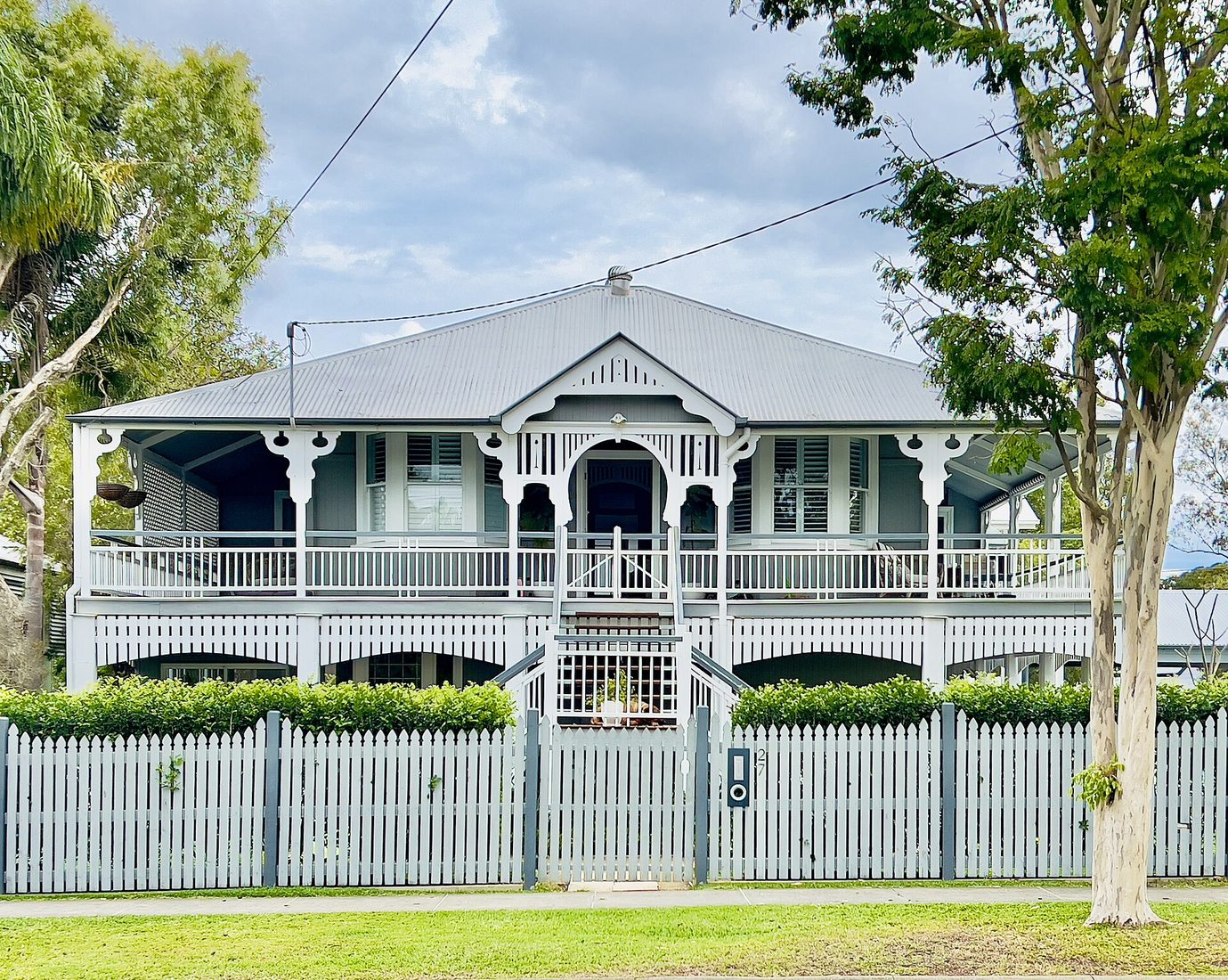 A timber Queenslander in Sherwood, Brisbane, with a verandah that still understands afternoon sun